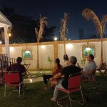 Lawn during event and people B